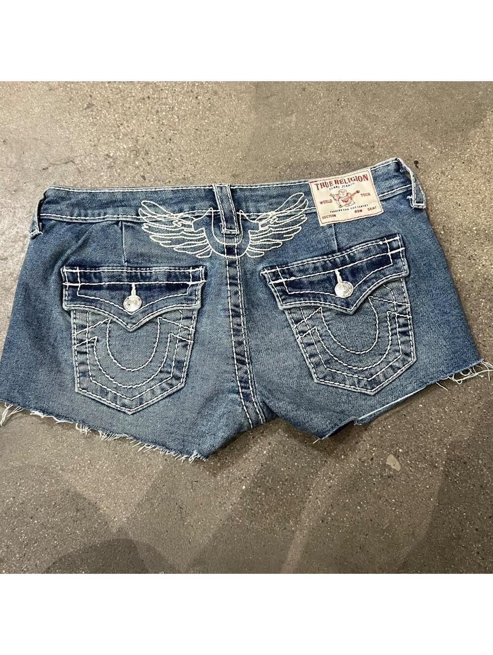 y2k true religion low rise shorts with angel wing detail